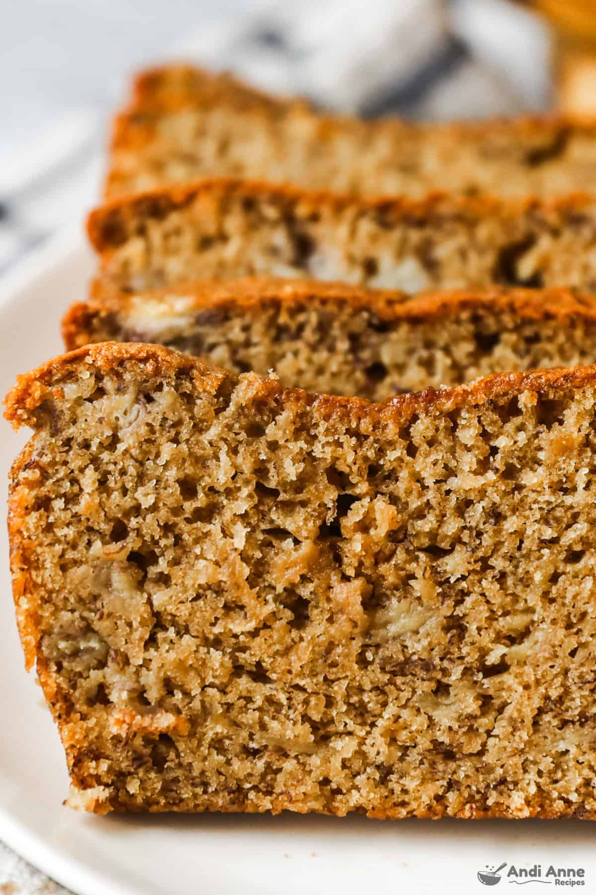 Slices of classic banana bread in a row.