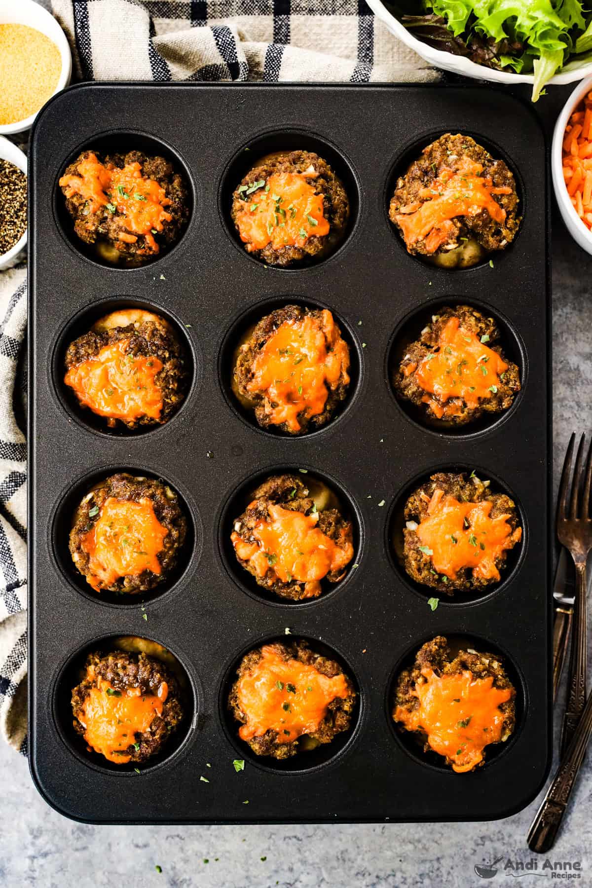 Cheeseburger tarts after baking in a muffin tin.