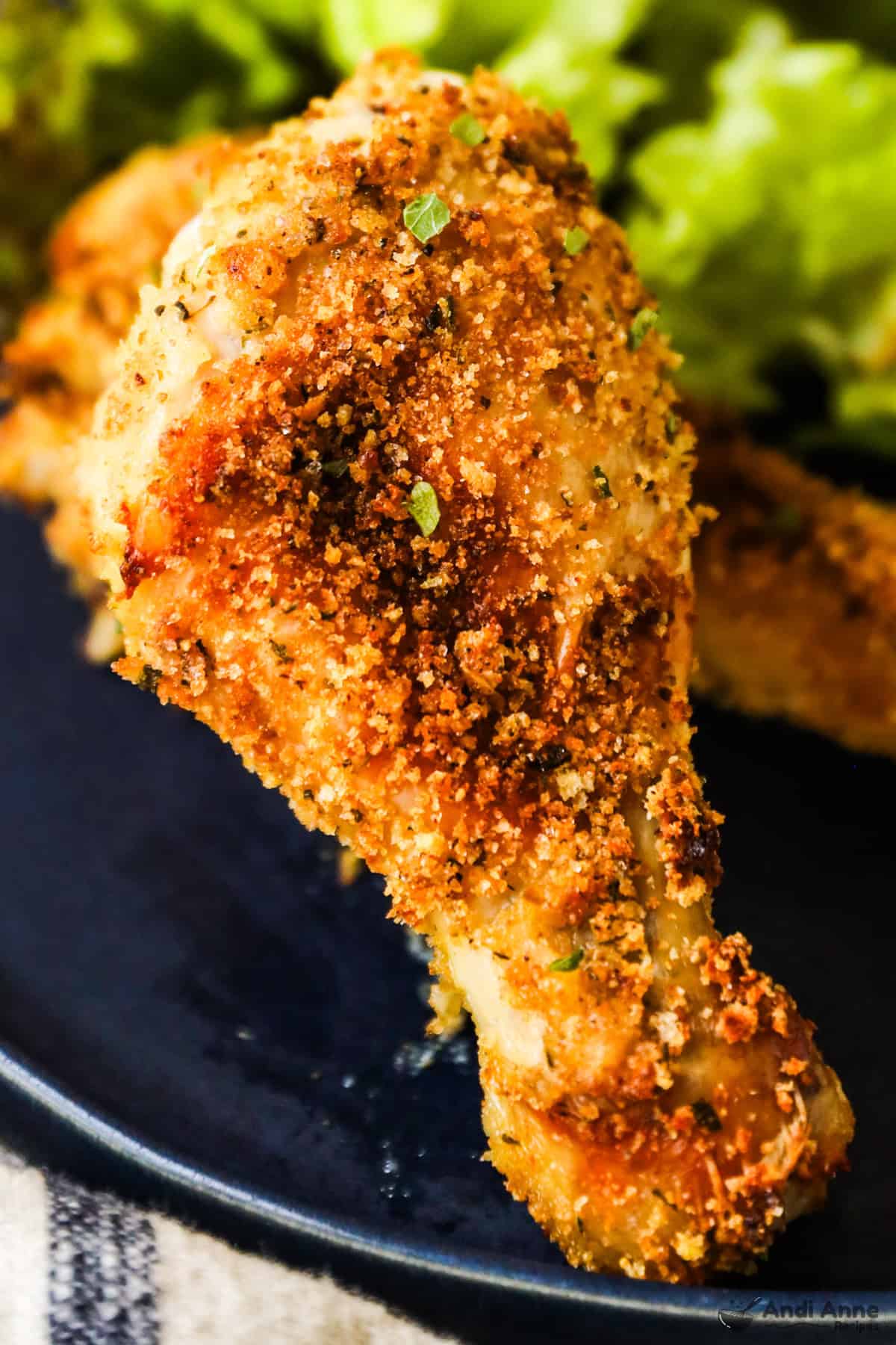 Crispy homemade shake and bake on a chicken leg.