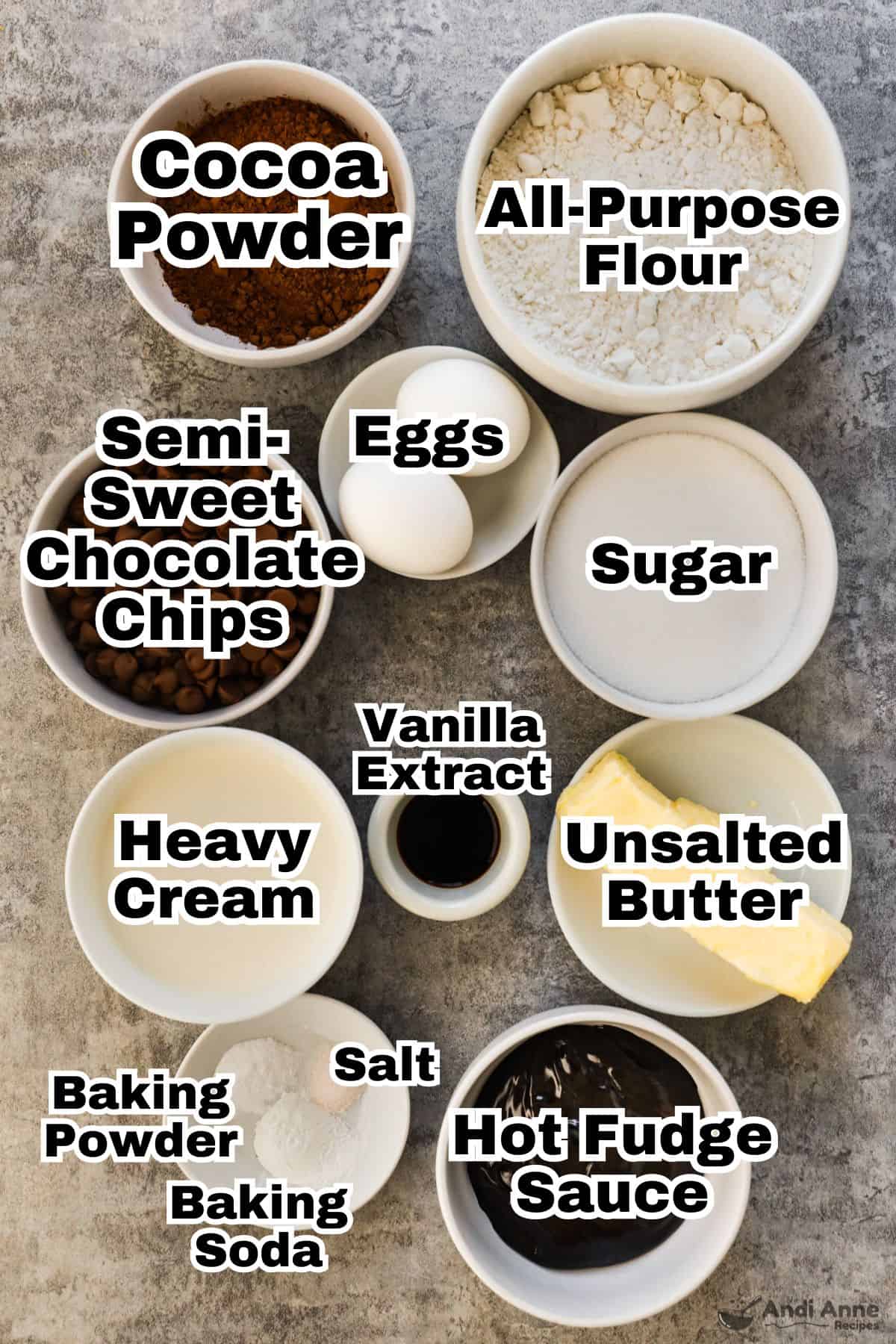 The ingredients to make hot fudge brownie bread are in small individual bowls.