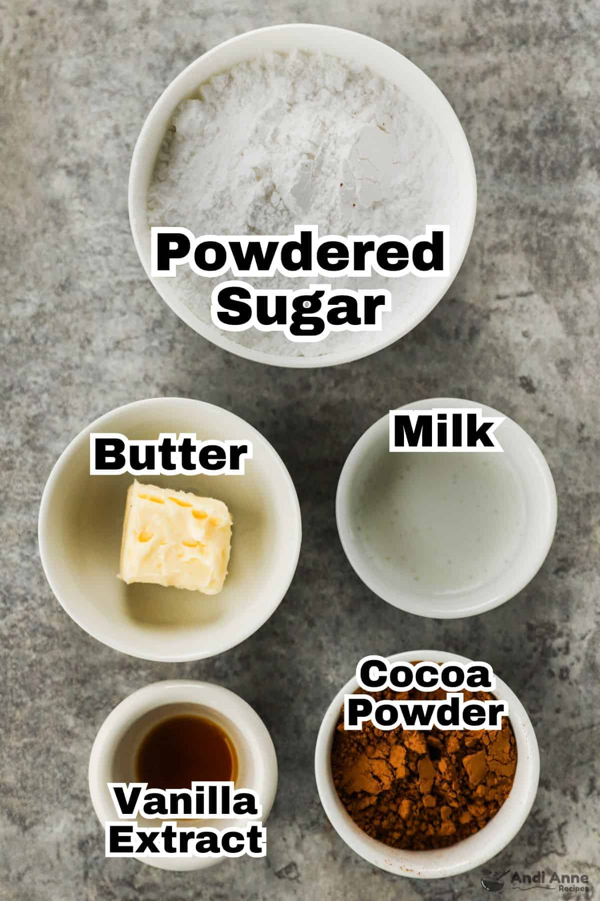 Chocolate frosting ingredients in small individual bowls. 