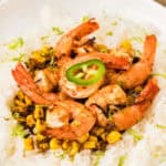 Chili lime shrimp with fire-roasted corn served over rice.
