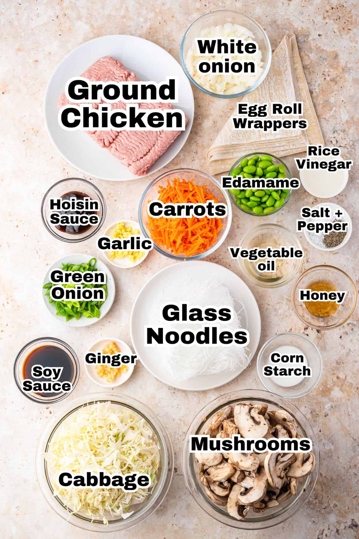 The ingredients for egg roll casserole in small individual bowls.