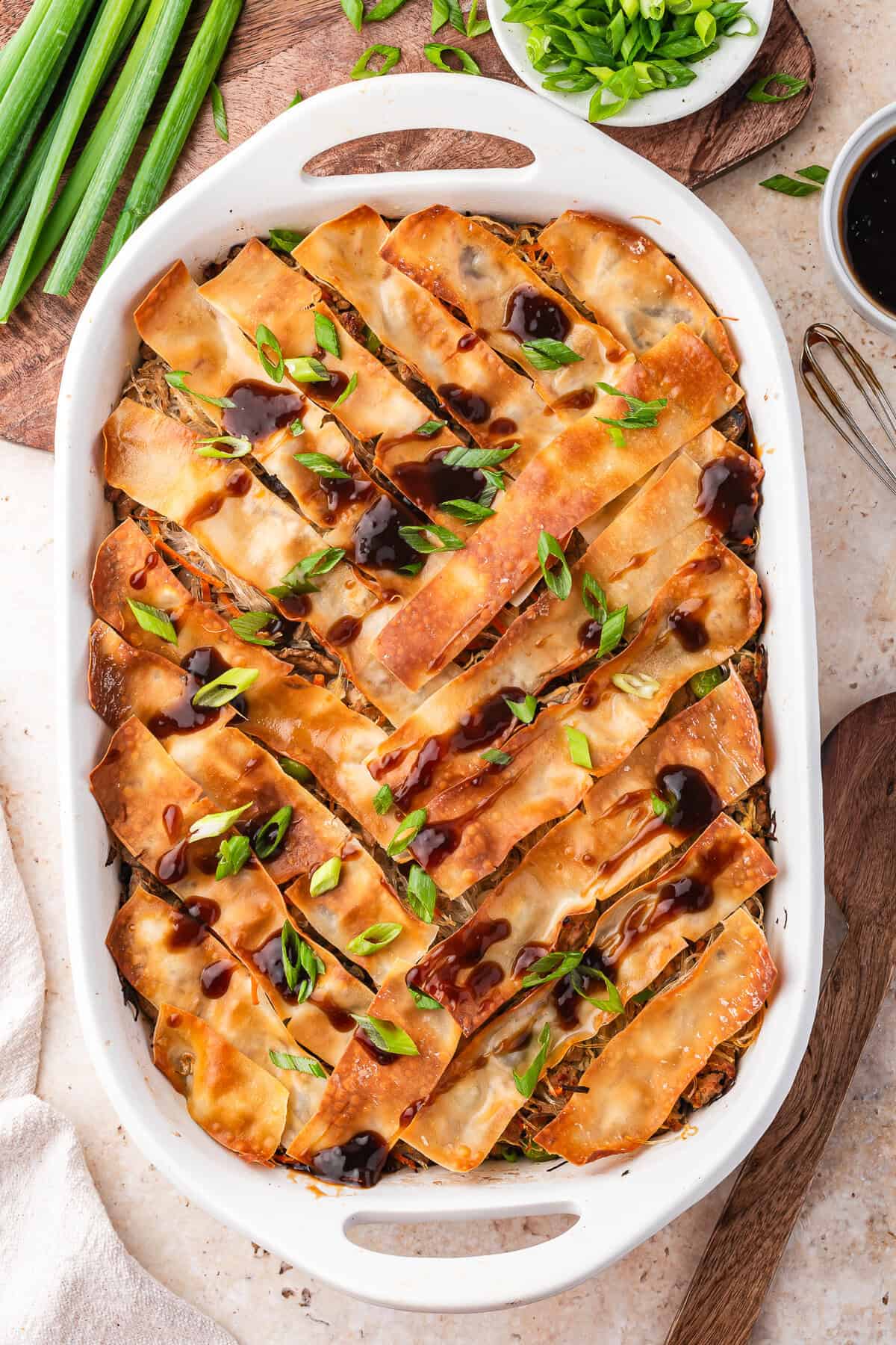 Egg roll casserole with crispy egg roll wrappers on top.