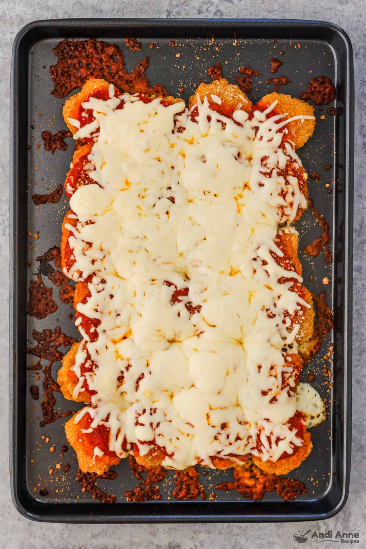 Chicken nuggets topped with marinara and melted cheese