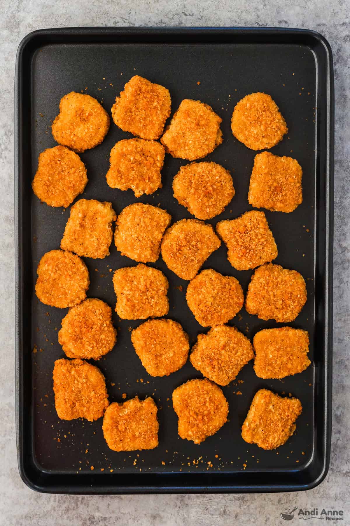 chicken nuggets on baking sheet