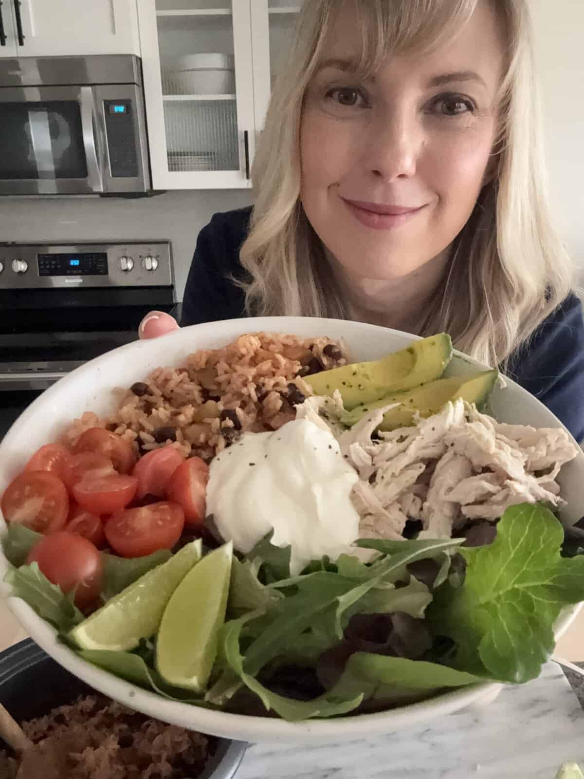 andi holding bowl of salad