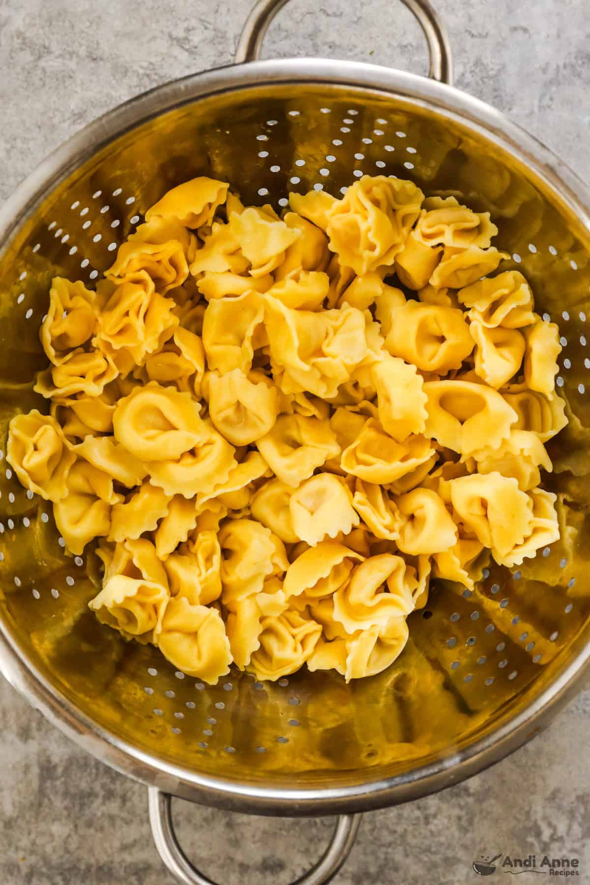 tortellini pasta in strainer