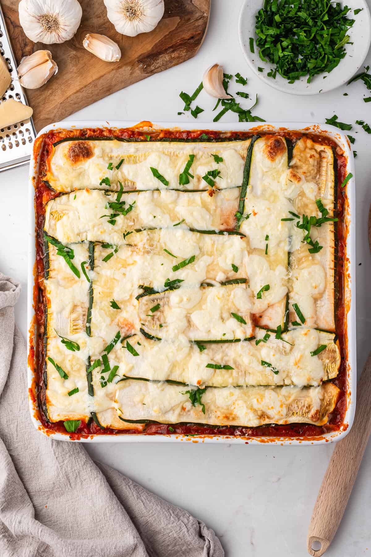Zucchini lasagna in a 9x9 baking pan.