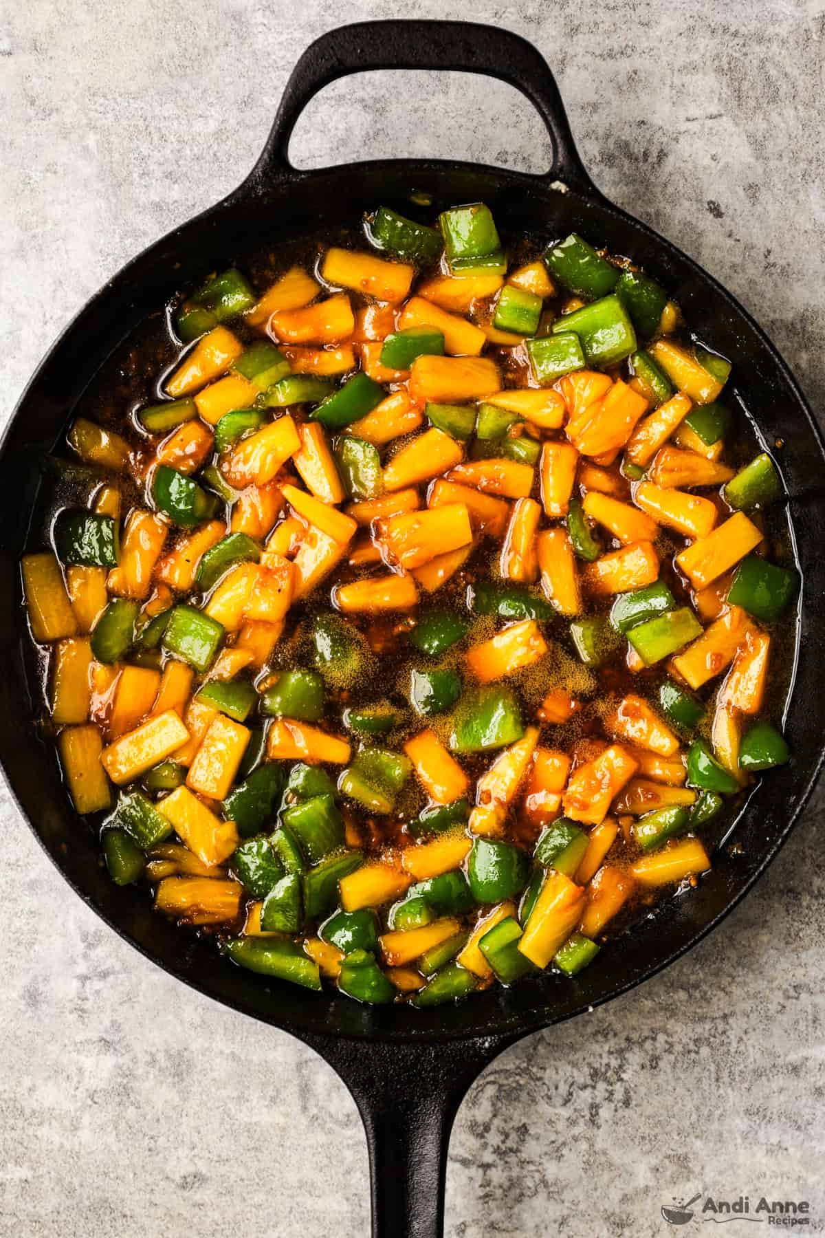 The bell peppers and pineapples are cooked in the honey garlic seasoning.