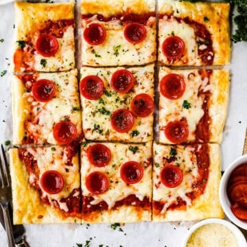 Pepperoni pizza with a puff pastry crust.
