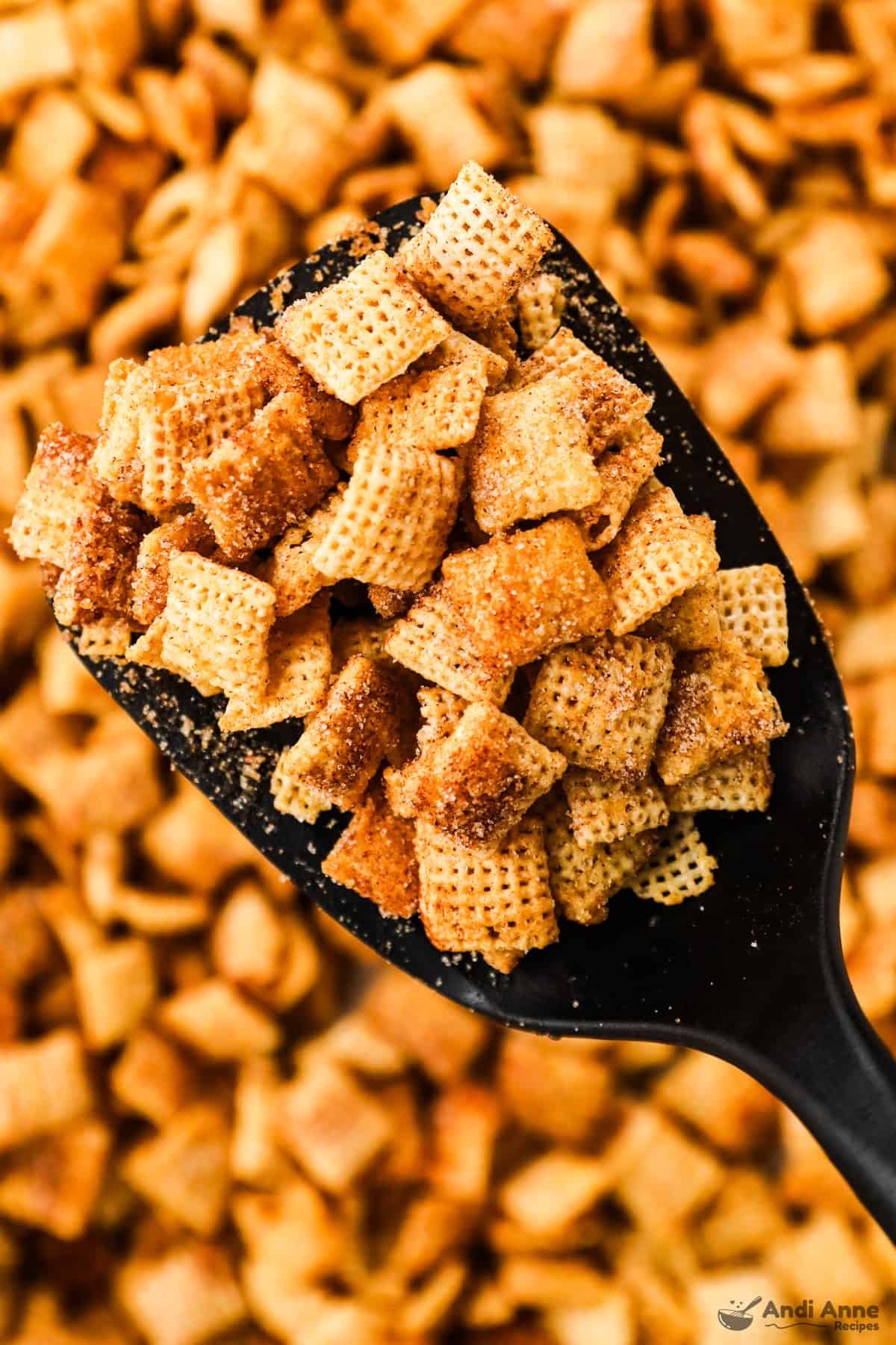 spatula with cinnamon sugar chex mix