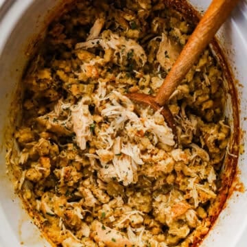 crockpot chicken and stuffing with wood spoon