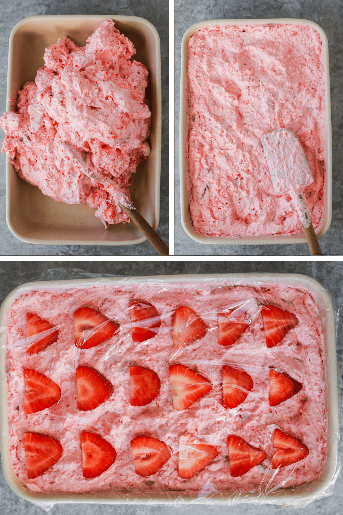 The strawberry angel food cake dessert is spread into a baking pan and topped with sliced strawberries.