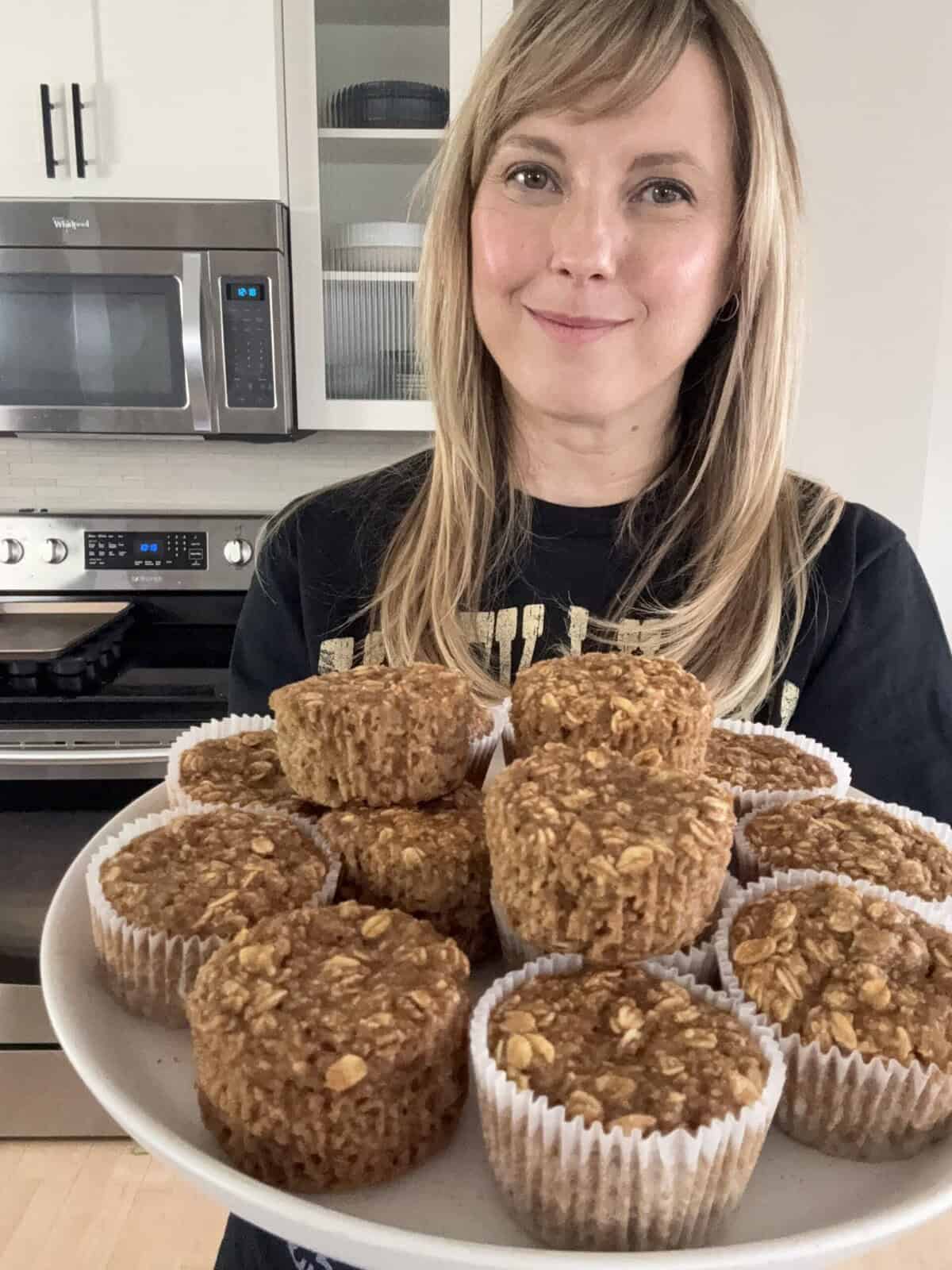 Andi with plate of banana oat muffins