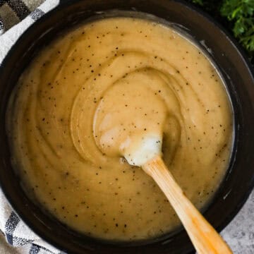 A pot of old-fashioned brown gravy.