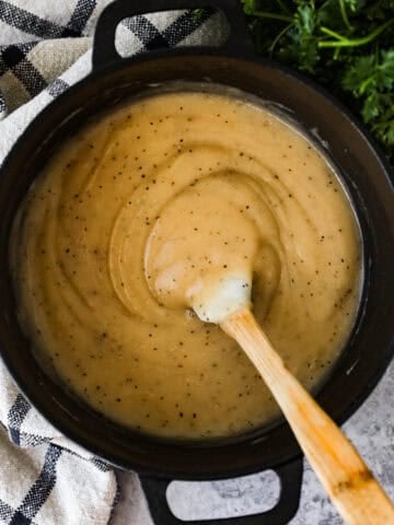 A pot of old-fashioned brown gravy.